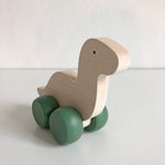 Load image into Gallery viewer, Dinosaur Push Toy - thetinycrate
