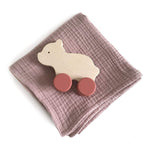 Load image into Gallery viewer, A beautiful set with handmade wooden bear with red wheels push toy. Also comes with a pink swaddle blanket. All wrapped up in a beautiful craft box.  
