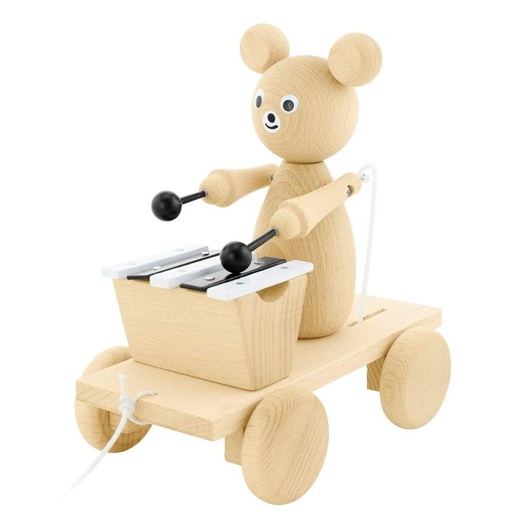 handmade wooden pull along bear with xylophone. beautiful natural coloured wood with painted bear face. Plays music wen pulled.