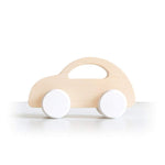 Load image into Gallery viewer, This beetle push car with white wheels has been handcrafted and hand-painted in Europe. Made from natural maple wood, it’s perfect for encouraging imaginative play with little ones. 
