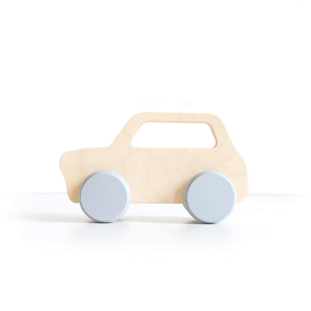 This wooden mini push car toy with grey trim has been handcrafted and hand-painted in Europe. Made from natural maple wood, it’s perfect for encouraging imaginative play with little ones. 