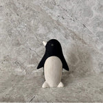 Load image into Gallery viewer, perfectly crafted wooden penguin toy with white belly and white nose 
